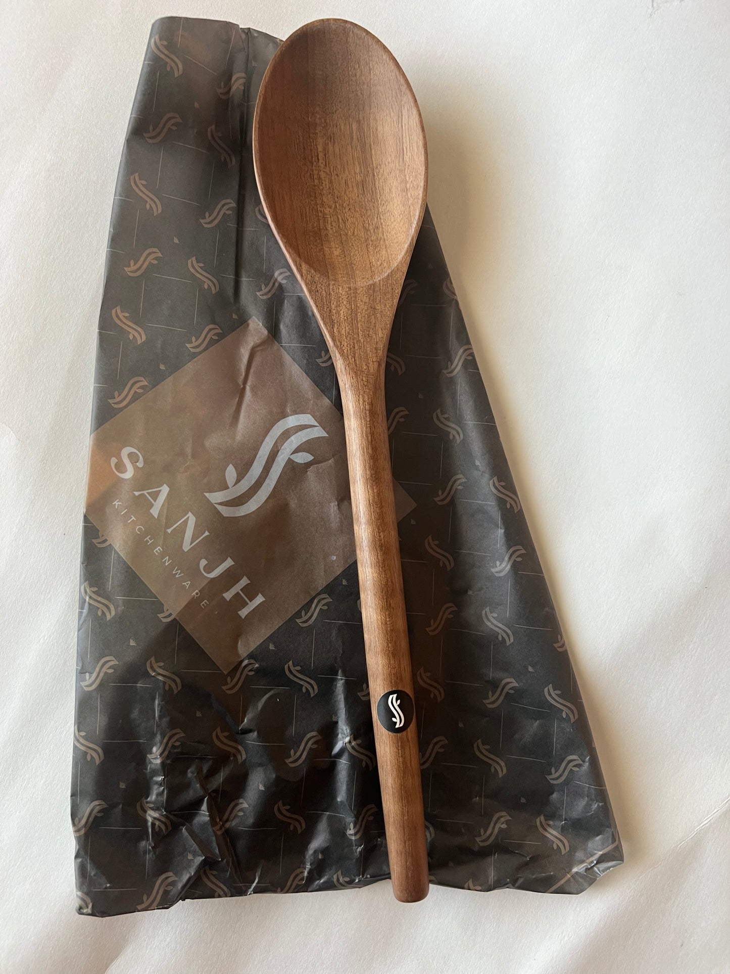 Cooking and serving spoon